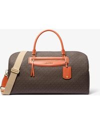MICHAEL Michael Kors - Mk Jet Set Travel Extra-Large Signature Logo Weekender Bag - Lyst