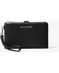MICHAEL Michael Kors - Cartera con bolsillo para teléfono y correa de muñeca - Lyst