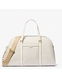Michael Kors - Jet Set Travel Extra-Large Signature Logo Weekender Bag - Lyst
