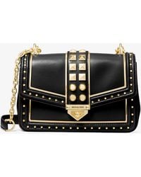 soho small studded leather and canvas shoulder bag