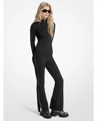 MICHAEL Michael Kors - Logo Tape Stretch Nylon Flared Leggings - Lyst