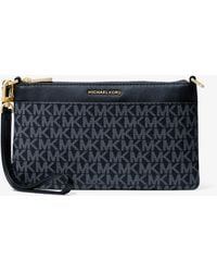 MICHAEL Michael Kors - Mk Jet Set Large Signature Logo Convertible Zip Wristlet - Lyst
