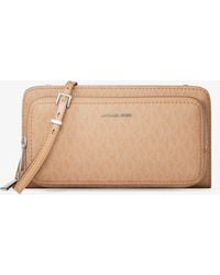 MICHAEL Michael Kors - Mk Jet Set Large Signature Logo Continental Crossbody Bag - Lyst