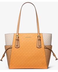 Michael Kors Outlet - Mk Grand Cabas Voyager À Couleurs Contrastées Et À Logo Signature - Lyst