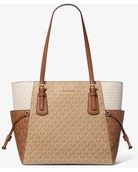 Michael Kors Outlet - Mkbolso Tote Voyager Grande Con Bloque De Color Y Logotipo - Lyst