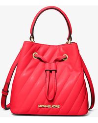 suri large graphic logo shoulder bag michael kors