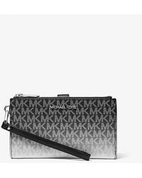 Michael Kors - Jet Set Large Ombré Signature Logo Wristlet - Lyst