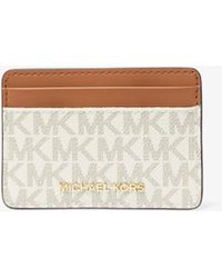MICHAEL Michael Kors - Michael Kors Jet Set Monogram Coated Canvas Purse - Lyst