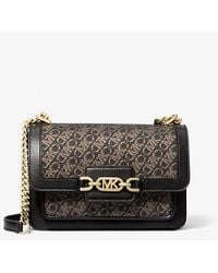 MICHAEL Michael Kors - Mk Heather Large Metallic Empire Signature Logo Shoulder Bag - Lyst