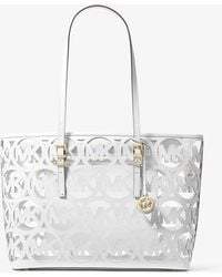 MICHAEL Michael Kors - Mk Quinn Large Laser-Cut Logo Tote Bag - Lyst