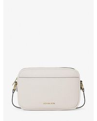 Michael Kors - Jet Set Large Pebbled Leather Camera Crossbody Bag - Lyst