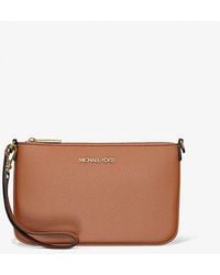 Michael Kors - Jet Set Small Pebbled Leather Convertible Wristlet - Lyst