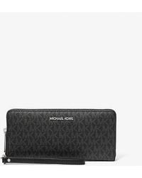 Michael Kors - Jet Set Travel Large Signature Logo Continental Wallet - Lyst