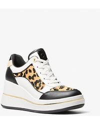 MICHAEL Michael Kors - Emmy Leather And Leopard Print Calf Hair Wedge Trainer - Lyst