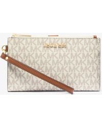 Michael Kors - Jet Set Travel Signature Logo Smartphone Wallet - Lyst