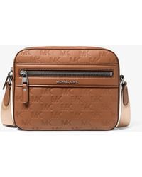 Michael Kors - Mk Jet Set Logo Embossed Leather Crossbody Bag - Lyst