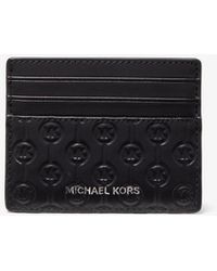 Michael Kors Porta carte di credito Hudson grande in pelle con logo in rilievo - Bianco