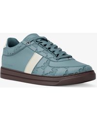 Michael Kors - Brady Logo Embossed Leather Sneaker - Lyst