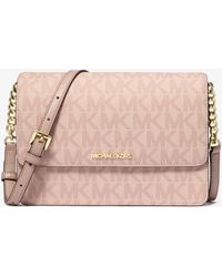 Michael Kors Outlet - Mk Daniela Large Signature Logo Crossbody Bag - Lyst
