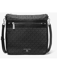Michael Kors - Jet Set Large Logo Print Woven Crossbody Bag - Lyst