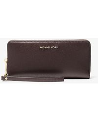 MICHAEL Michael Kors - Mk Jet Set Travel Large Pebbled Leather Continental Wallet - Lyst