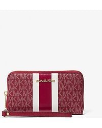 Michael Kors - Jet Set Large Metallic Signature Logo Stripe Smartphone Wallet - Lyst
