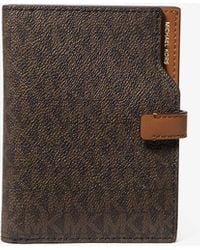 Michael Kors - Mk Jet Set Signature Logo Passport Wallet - Lyst