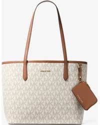 Michael Kors Outlet - Mk Jet Set Large Signature Logo Tote Bag - Lyst
