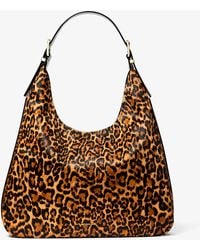 Michael Kors - Mk Grand Sac Porté Épaule Nolita En Poil De Vachette À Imprimé Léopard - Lyst