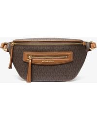 MICHAEL Michael Kors - Mk Jet Set Travel Medium Signature Logo Sling Pack - Lyst