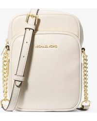 Michael Kors Outlet - Mk Jet Set Travel Medium Pebbled Leather Crossbody Bag - Lyst
