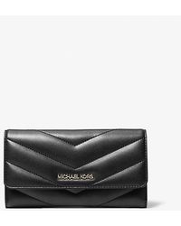 Michael Kors - Jet Set Travel Large Quilted Tri-Fold Wallet - Lyst