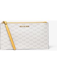 michael michael kors jet set logo coated canvas pouch
