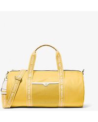 Michael Kors - Jet Set Large Logo Tape Nylon Weekender Bag - Lyst