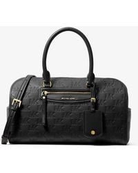 MICHAEL Michael Kors - Mk Jet Set Travel Medium Logo Embossed Leather Duffel Crossbody Bag - Lyst