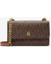 Michael Kors Outlet - Mk Abbott Small Signature Logo Shoulder Bag - Lyst
