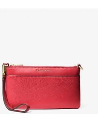 Michael Kors - Mk Jet Set Medium Pebbled Leather Wristlet - Lyst