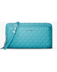 MICHAEL Michael Kors - Mk Jet Set Large Signature Logo Continental Crossbody Bag - Lyst