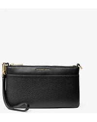 MICHAEL Michael Kors - Jet Set Medium Pebbled Leather Wristlet - Lyst