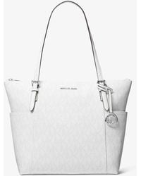 Michael Kors Outlet - Mk Jet Set Medium Signature Logo Top-Zip Tote Bag - Lyst