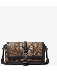 Michael Kors - Cyrus Small Snake Embossed Crossbody Bag - Lyst