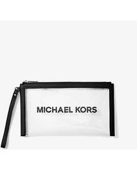 Michael Kors - Jet Set Travel Large Clear Vinyl Wristlet - Lyst