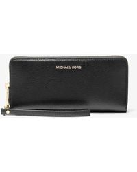 MICHAEL Michael Kors - Mk Jet Set Travel Large Pebbled Leather Continental Wallet - Lyst