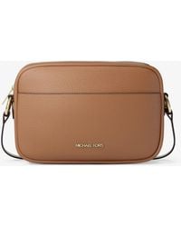 Michael Kors - Jet Set Large Pebbled Leather Camera Crossbody Bag - Lyst