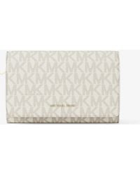 MICHAEL Michael Kors - Mk Jet Set Large Signature Logo Wallet - Lyst