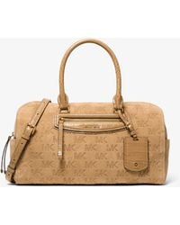 MICHAEL Michael Kors - Michael Kors Jet Set Travel Medium Logo Embossed Suede Duffel Crossbody Bag - Lyst
