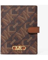 MICHAEL Michael Kors - Mk Empire Medium Signature Logo Passport Wallet - Lyst