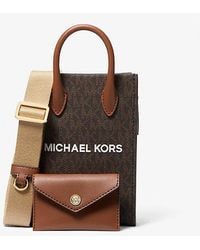 Michael Kors - Mirella Extra-small Signature Logo Smartphone Crossbody Bag - Lyst