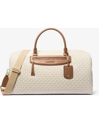 MICHAEL Michael Kors - Mk Jet Set Travel Extra-Large Signature Logo Weekender Bag - Lyst