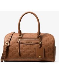 MICHAEL Michael Kors - Mk Jet Set Travel Medium Logo Embossed Leather Duffel Crossbody Bag - Lyst